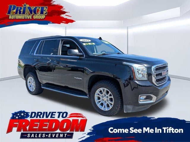 2019 GMC Yukon SLT in Onyx Black — front three-quarter view