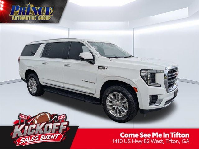 2023 GMC Yukon XL SLT in Summit White — front three-quarter view