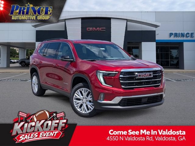 2026 GMC Acadia Elevation in Volcanic Red Tintcoat — front three-quarter view