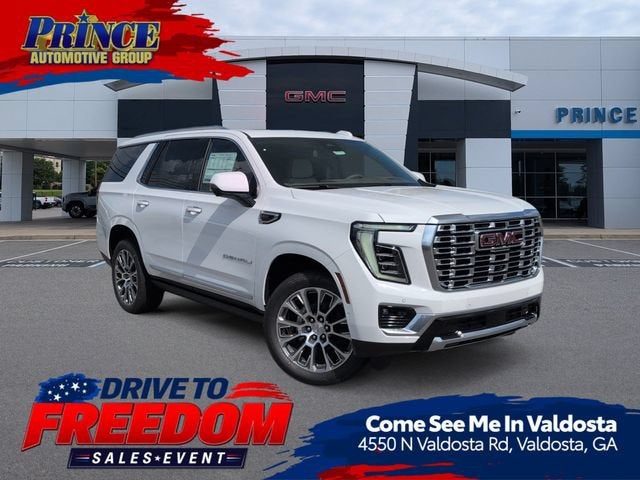 2026 GMC Yukon Denali in Summit White — front three-quarter view