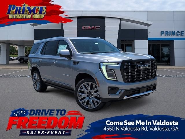 2026 GMC Yukon Denali Ultimate in Sterling Metallic — front three-quarter view