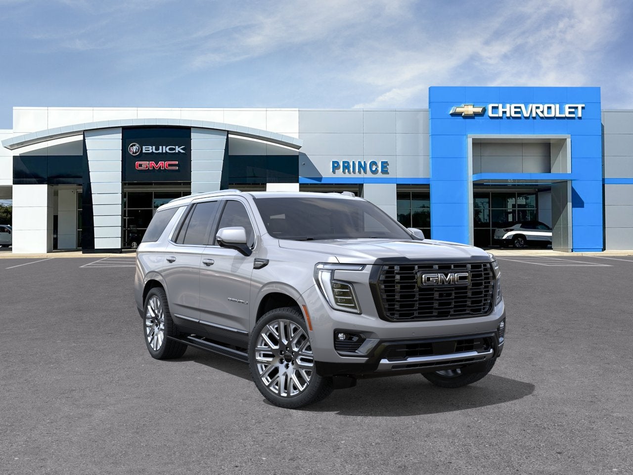 2026 GMC Yukon Denali Ultimate in Sterling Metallic — front three-quarter view
