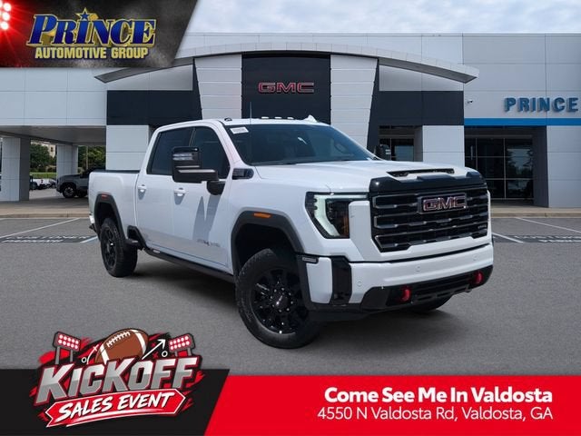 2026 GMC Sierra 2500 HD AT4 in Summit White — front three-quarter view