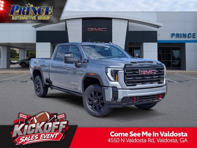 2026 GMC Sierra 2500 HD AT4 in Sterling Metallic — front three-quarter view
