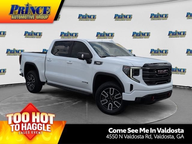 2026 GMC Sierra 1500 AT4 in Summit White — front three-quarter view
