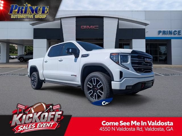 2026 GMC Sierra 1500 AT4 in Summit White — front three-quarter view