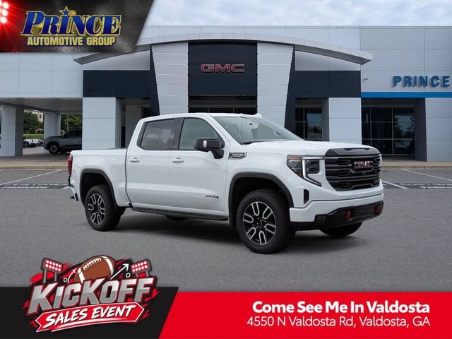 2026 GMC Sierra 1500 AT4 in Summit White — front three-quarter view
