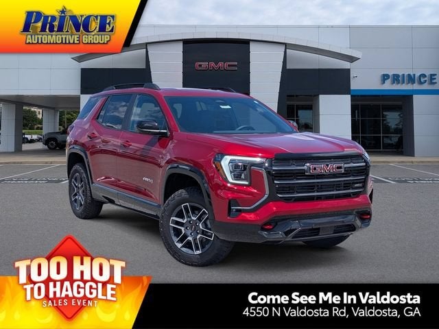 2026 GMC Terrain AT4 in Volcanic Red Tintcoat — front three-quarter view