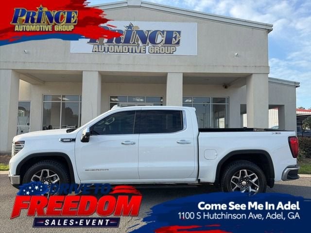 2024 GMC Sierra 1500 SLT in Summit White — front three-quarter view