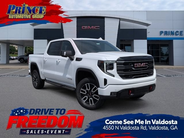 2026 GMC Sierra 1500 AT4 in Summit White — front three-quarter view