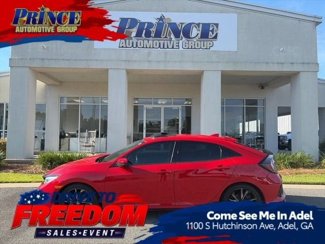 2018 Honda Civic Hatchback Sport Touring in Red — front three-quarter view