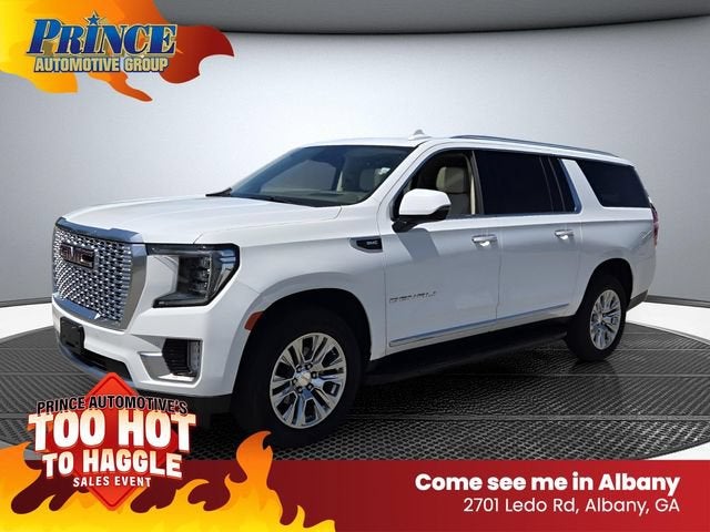 2024 GMC Yukon XL Denali in Summit White — front three-quarter view