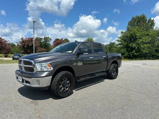 2016 RAM 1500 Big Horn in Grey — front three-quarter view