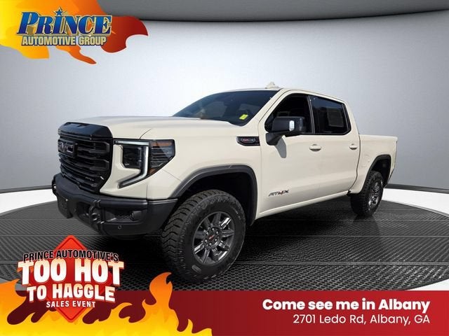 2026 GMC Sierra 1500 AT4X in Coastal Dune — front three-quarter view
