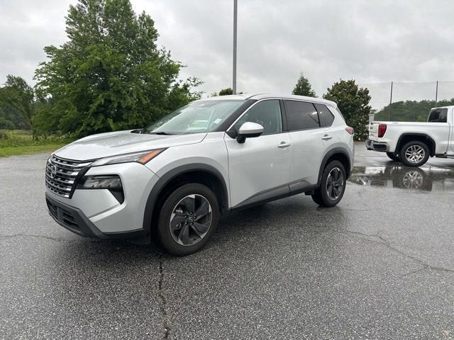 2024 Nissan Rogue SV in Silver — front three-quarter view
